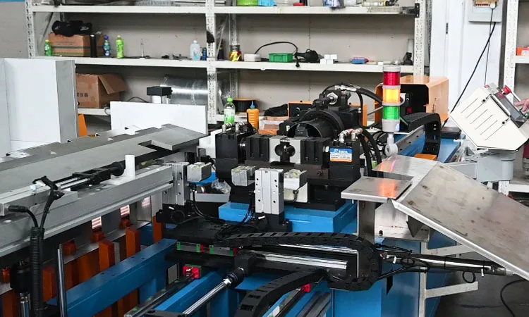BOBO Machine automatic metal copper pipe hole punching and flanging shown in a detail photo for this news article