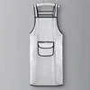 White, extra long style with pockets for wiping hands.