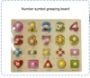 Number symbol grasping board