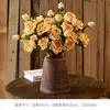 10 champagne-colored bottles (vase not included)