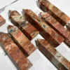 Pietra del Sole Dorata con Punta di Apatite Blu