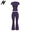 Completo con Top a Maniche Corte Viola e Pantaloni a Zampa