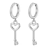 llave de corazón de plata