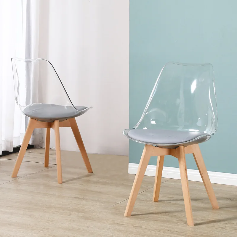 clear chair with wood legs