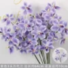 Rama de Vanda púrpura de 3 cabezas