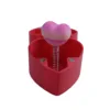 Caja roja - corazón rosa melocotón