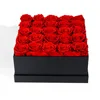 25 flores en una caja cuadrada (cubo blanco/negro)