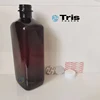 Nuova etichetta Tris Purple con bottiglie e tappo