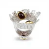 Rodio bianco + oro 18 carati