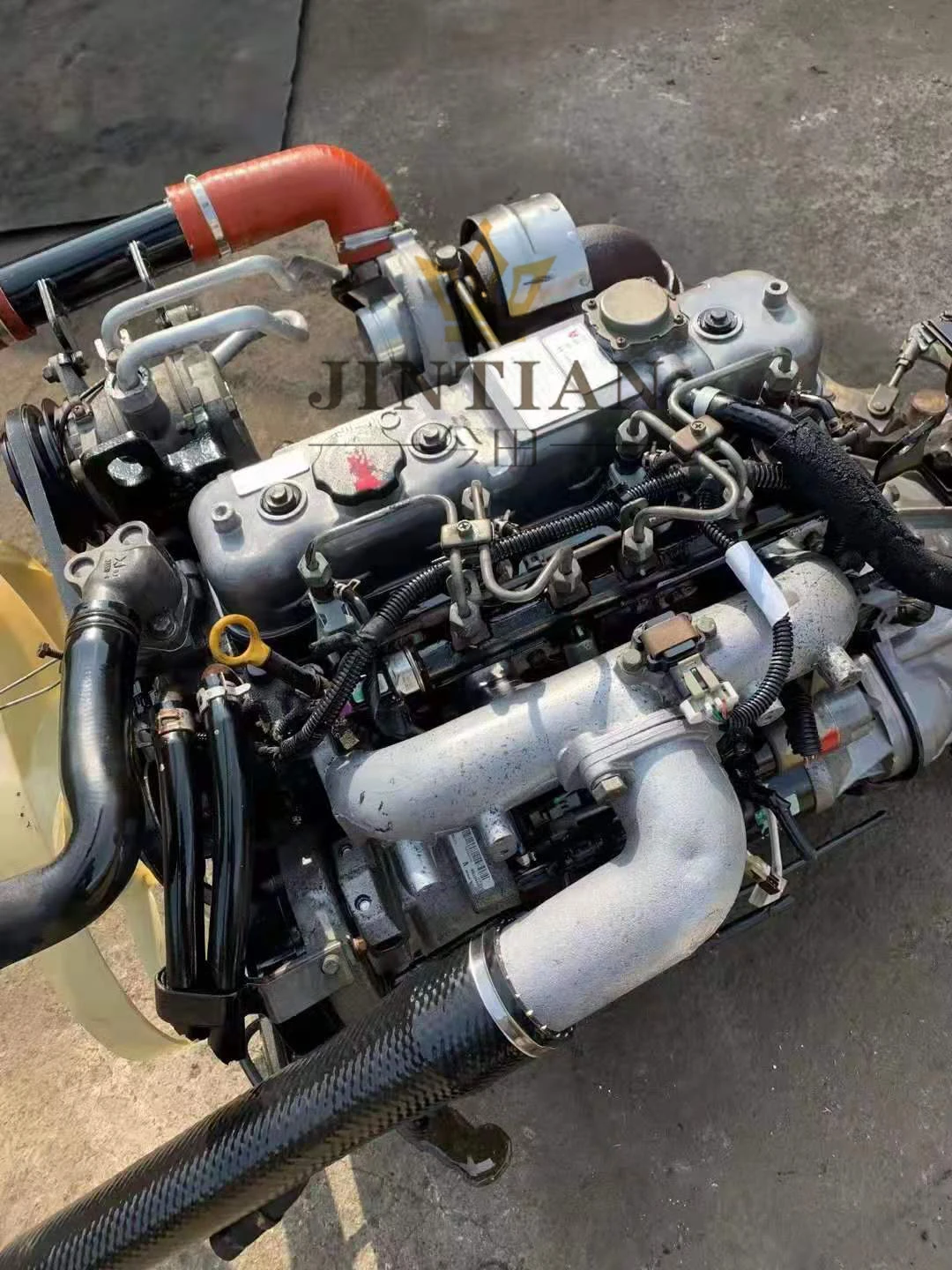 Alibaba.com: Used JX493 4-cylinder diesel engine assembly