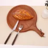 Molde para pizza redondo de ébano de 40*30*2 cm.