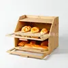 Two-layer bread box with button A