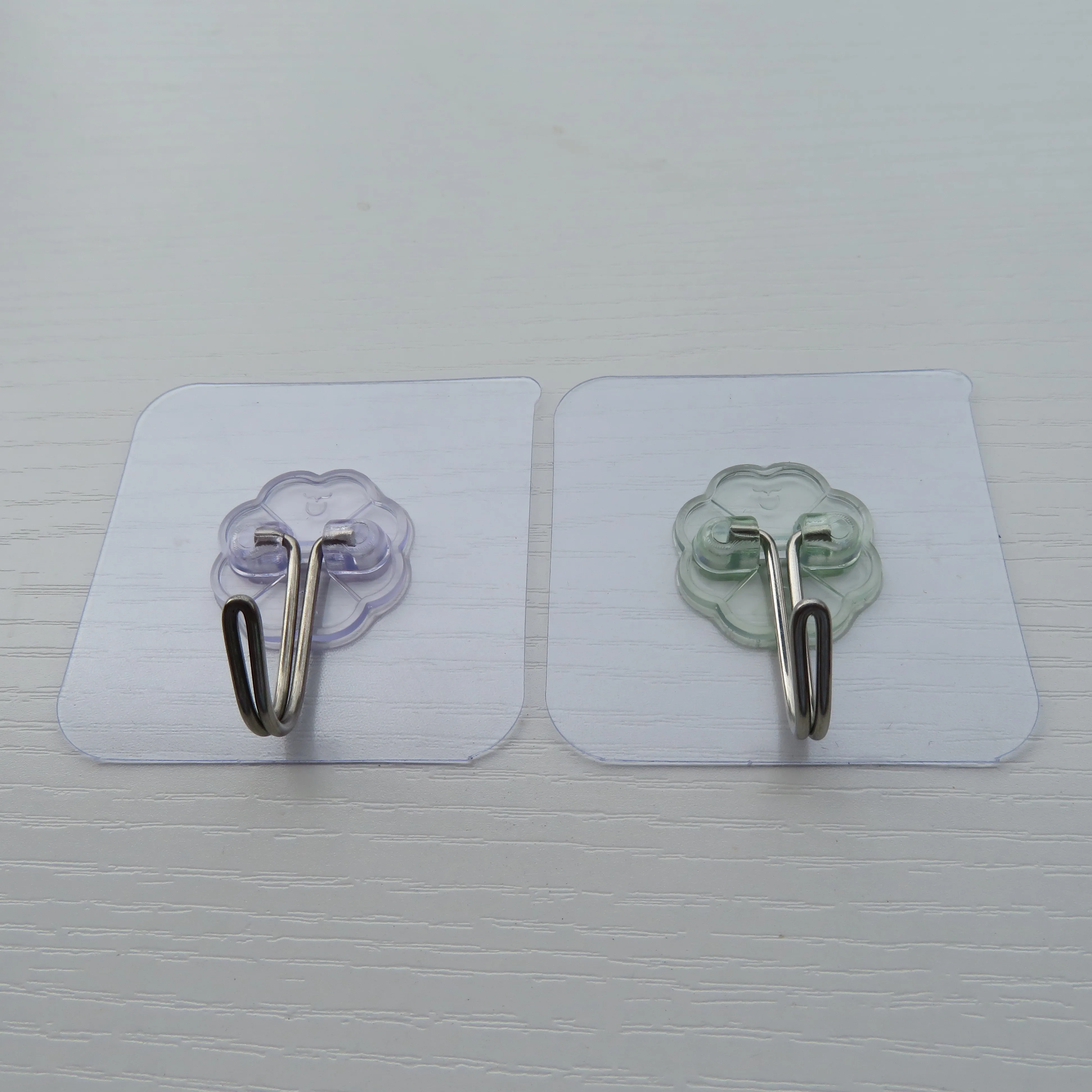 Can process and customize a variety of color plum pieces of metal traceless novelty hooks factory direct sales factory