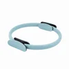 blue reformer with pilates rings