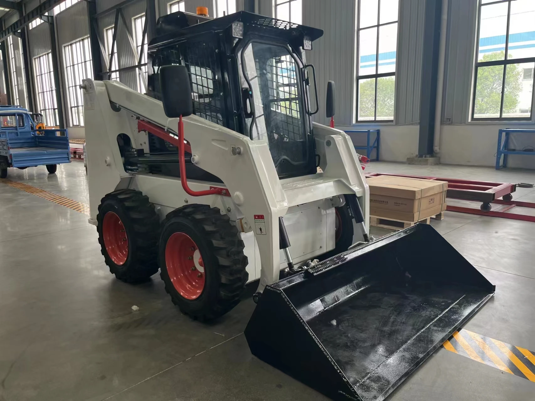 china cheap mini skid steer loader with track hydraulic control wheel skid steer loader attachment with 4 in 1 bucket factory