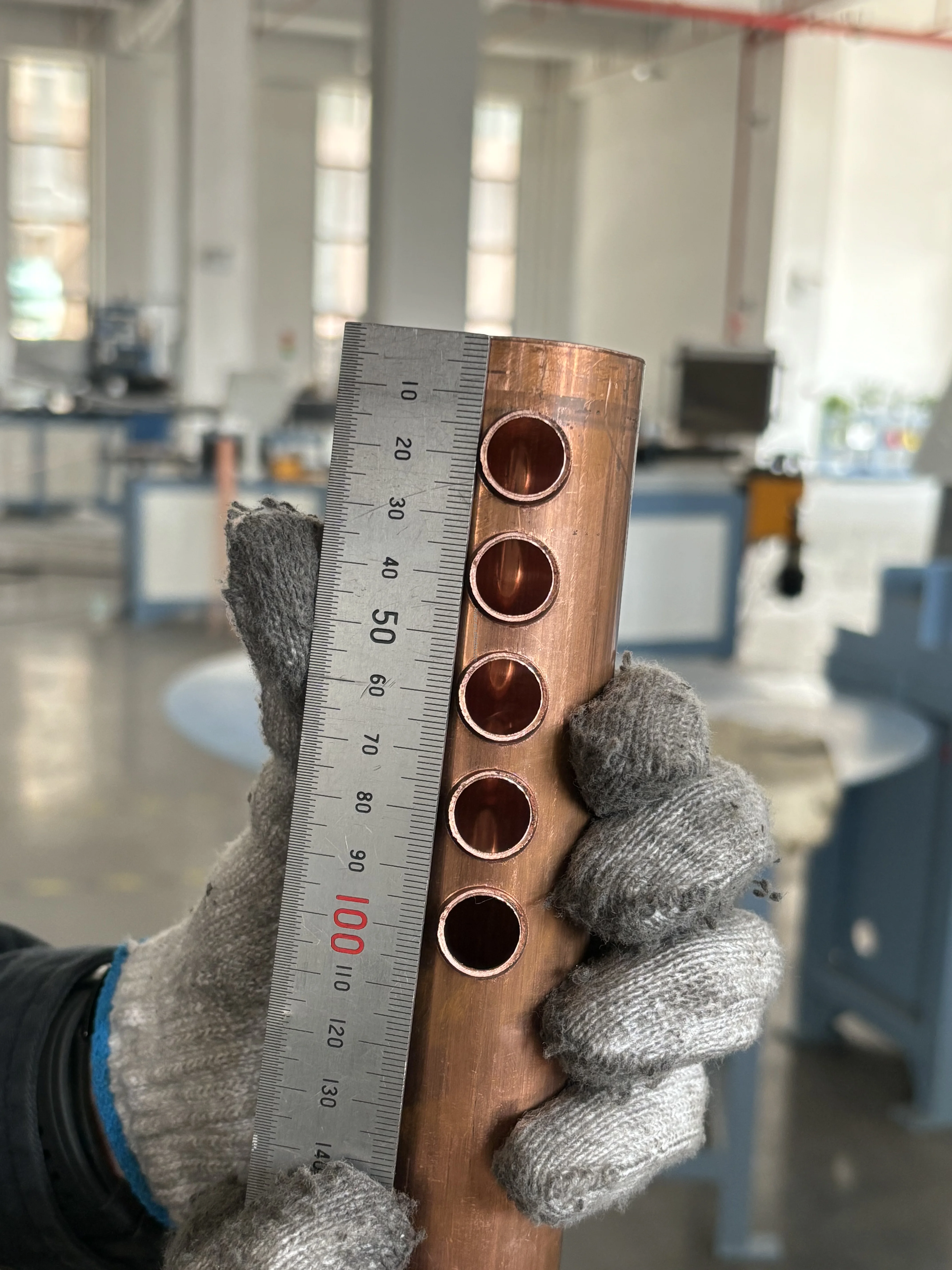 BOBO Machine copper tube hole pipe punching machine for solar shown in a detail photo for this news article