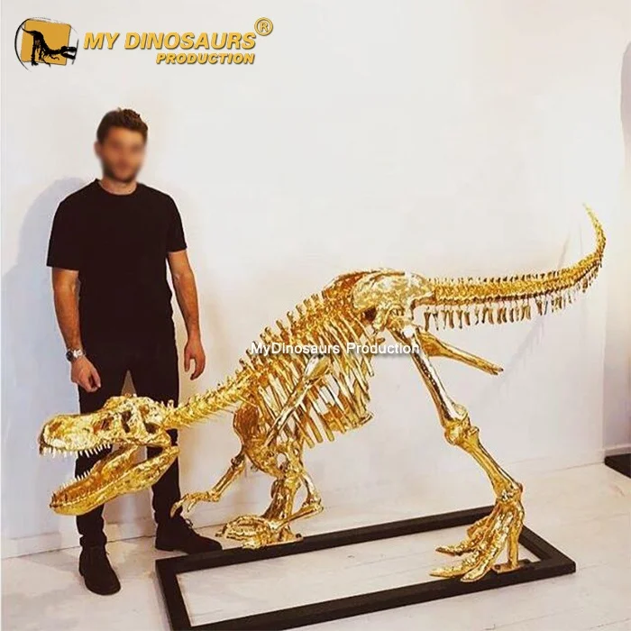 Золотой динозавр. Золотой скелет. Кости динозавров из золото. АА Дино.