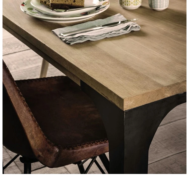 Vintage metal herringbone reclaimed wood dining table