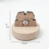 Solid wood carved flower desktop trimmer, No. 2, peach blossom design.