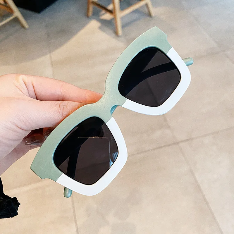 designer sunglasses with two dots on the side