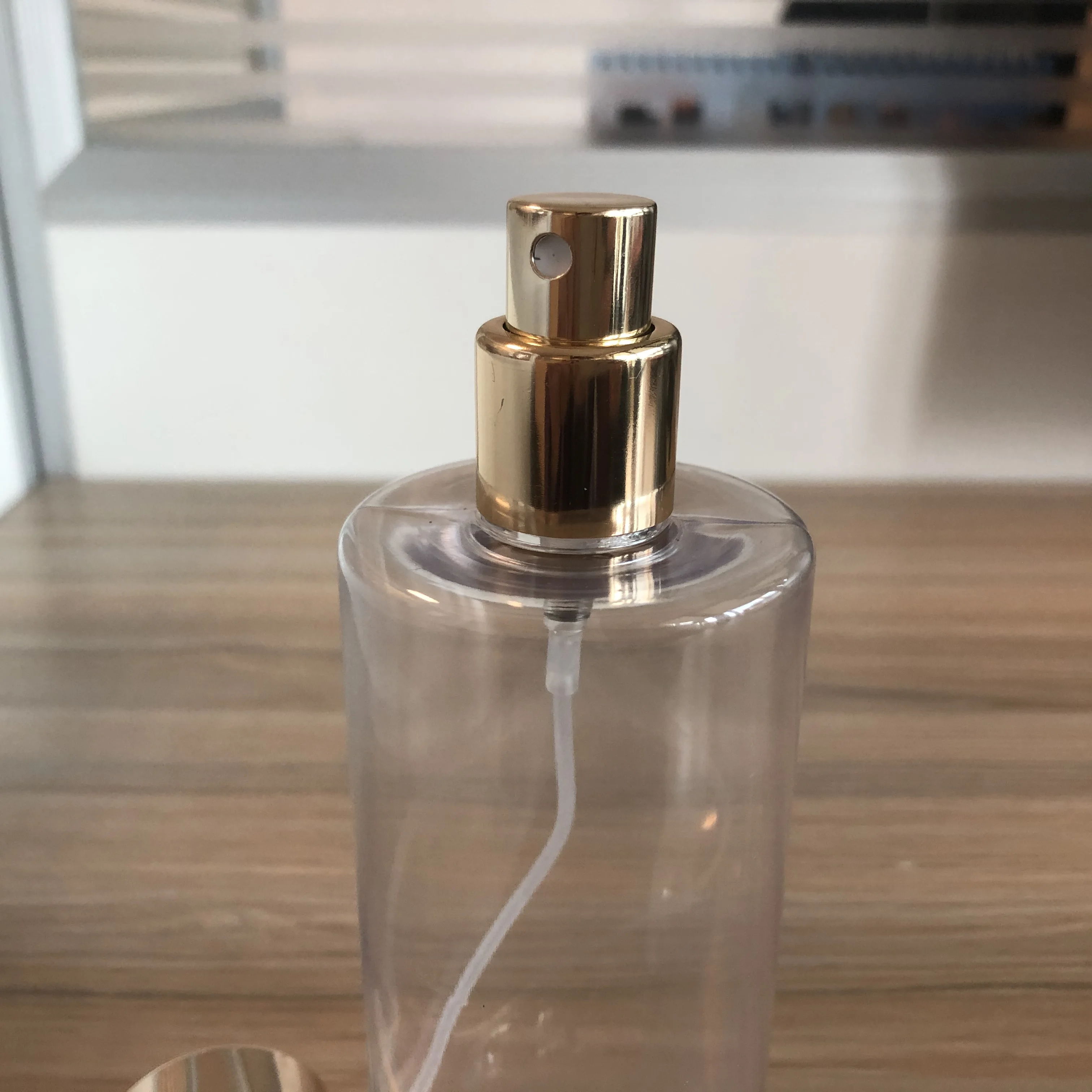 High End Custom  Plastic Perfume Bottles Gold 250ml Pet Transparent Aerosol Spray Perfume Bottle