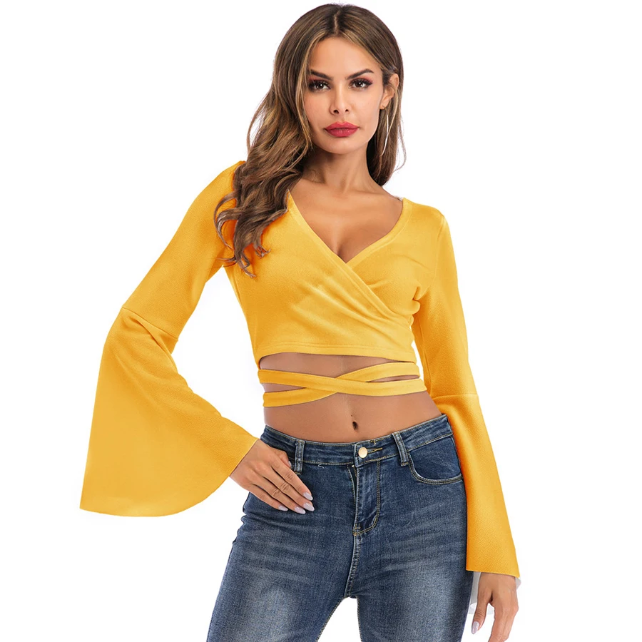 V-neck crop top with bell sleeves.