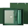 Confezione regalo verde con penna e tazza