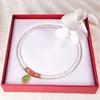 Collier + certificat + boîte en velours (goutte d'eau : 42cm)