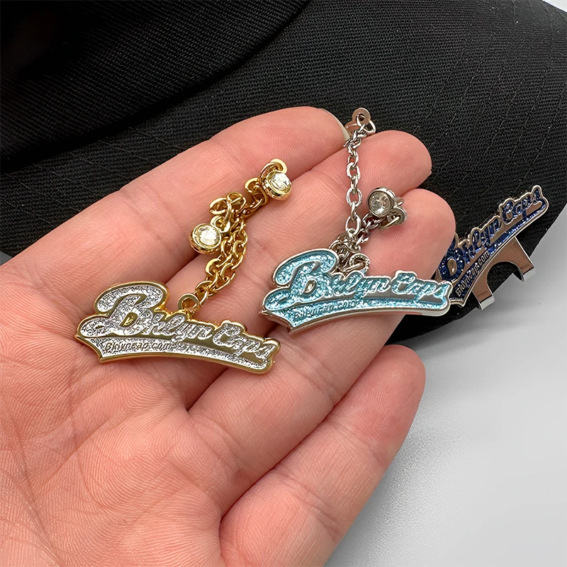 Custom Different Plating Hat Clips Soft Enamel Lapel Pins Shiny Glitter Custom Hat Pins manufacture