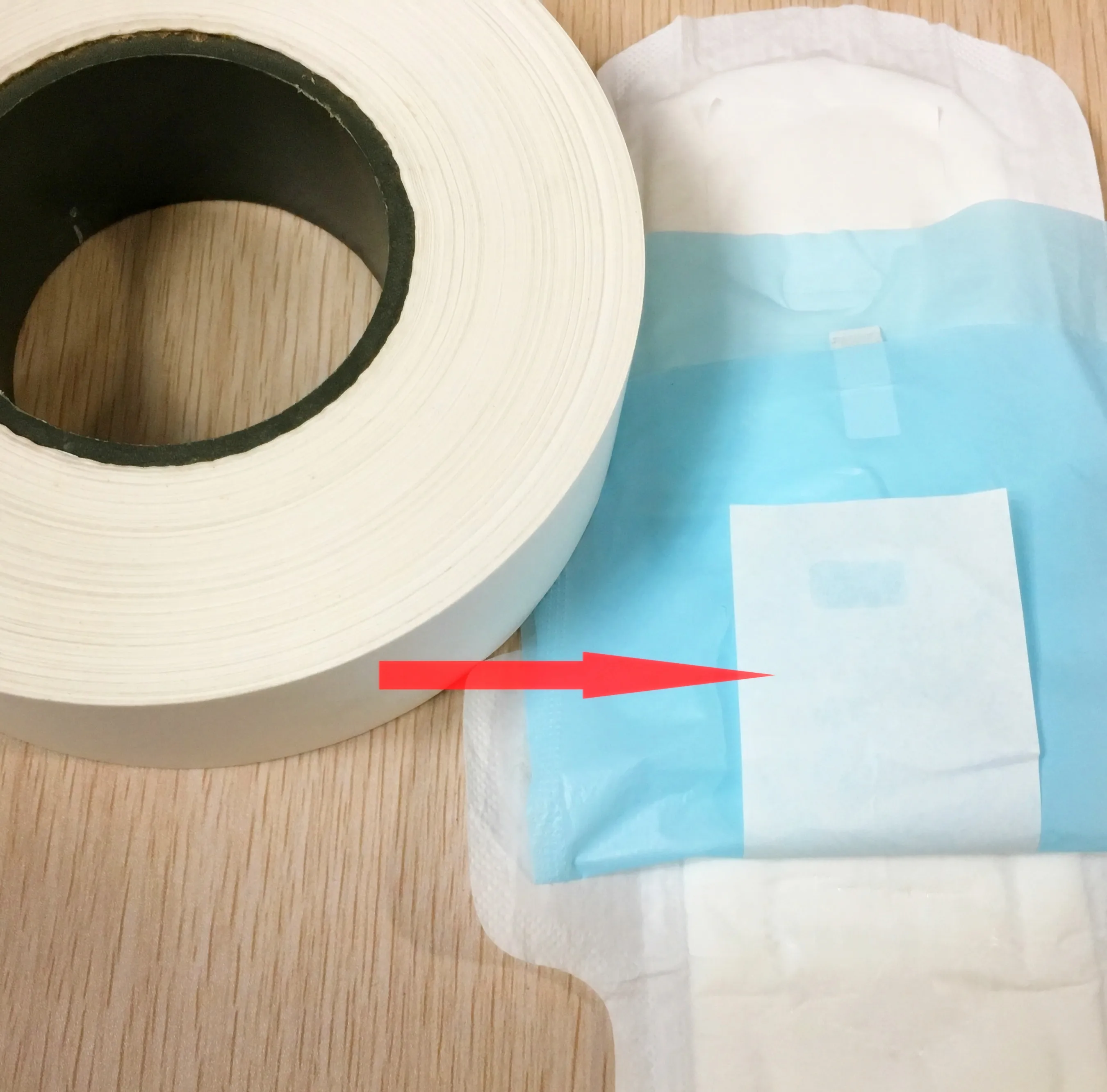 In Bulk Jumbo Roll Release Paper for Sanitary Towel Making Sanitary Pad Raw Material
