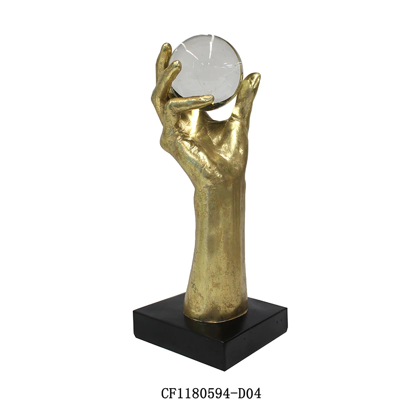 Resin hand with crystal ball home and table decoration details