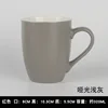 Matte light gray drum-shaped cup