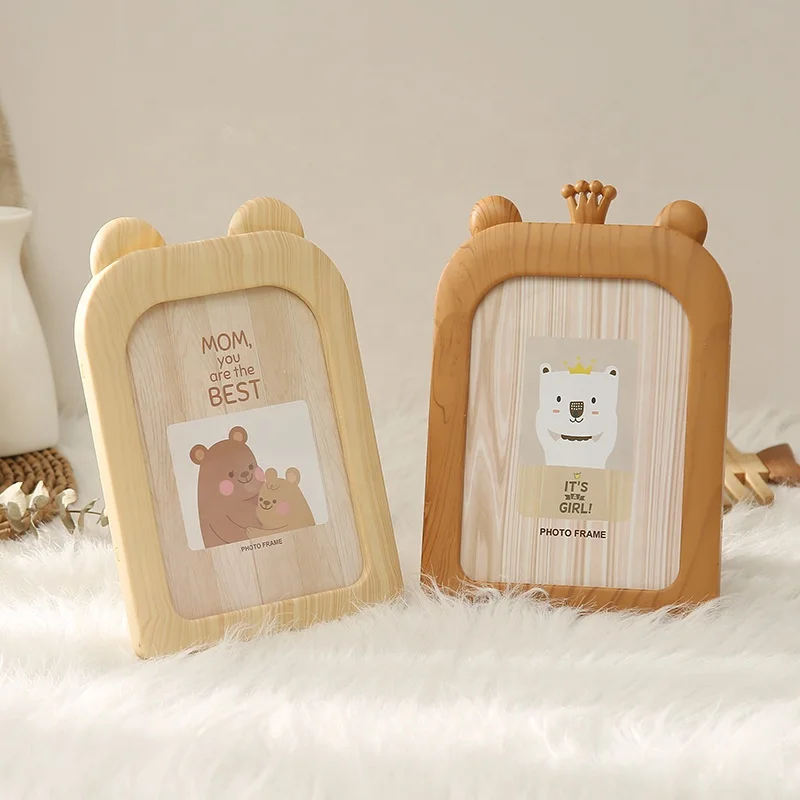 2023 New Design 7 Inch Solid Wood Animal Shape Kids Photo Frame Table
