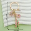Mariposa rosa de perlas y lirios para el Día de la Madre - 96g - ER1542