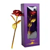 Purple boxed red roses