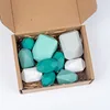 10 green stacked stones