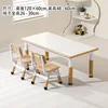 Whiteboard, brown table, two chairs