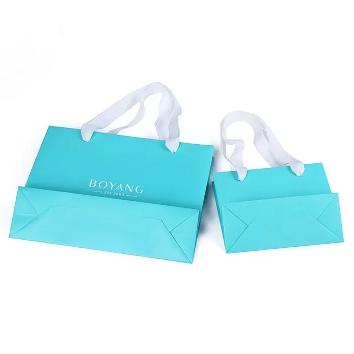 Source Luxury Matte Logo Blue Shopping Fancy Paper Gift Bag For Clothing  Packaging on m.