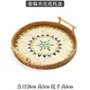 Large rattan-woven shell-bottomed tray