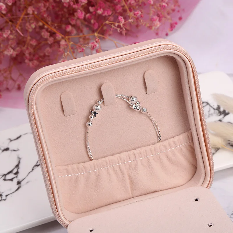 Minimalist jewelry storage with velvet lining compartments