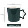 Glossy dark green star handle
