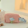 Pink corduroy wrist bag