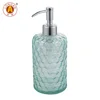 Blue glass bottle with matte lotion pump