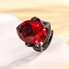 Anillo de corindón rojo oro negro de tamaño ajustable