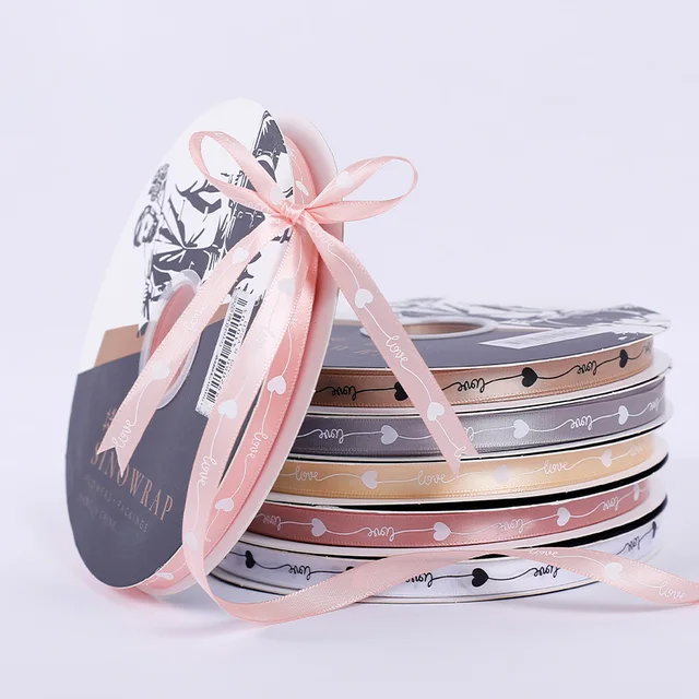 Wholesale 1cm heart design embossed printed polyester satin ribbon flower packaging ribbons