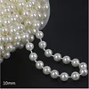 Un mètre de perles en fil de coton 10 mm (blanc cassé)