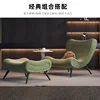 Snail single chair with footrest + green + art coffee table