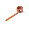 Brown spout spoon
