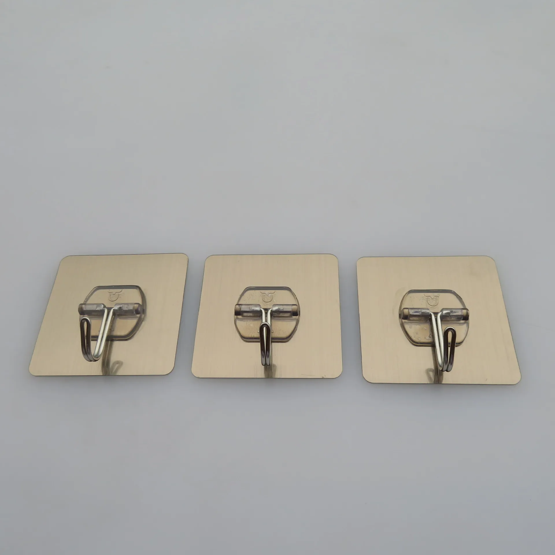 Manufacturer direct sales Traceless paste stainless steel hook strong self-adhesive hook five row hook supplier