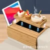 Sofa armrest tray with integrated phone holder